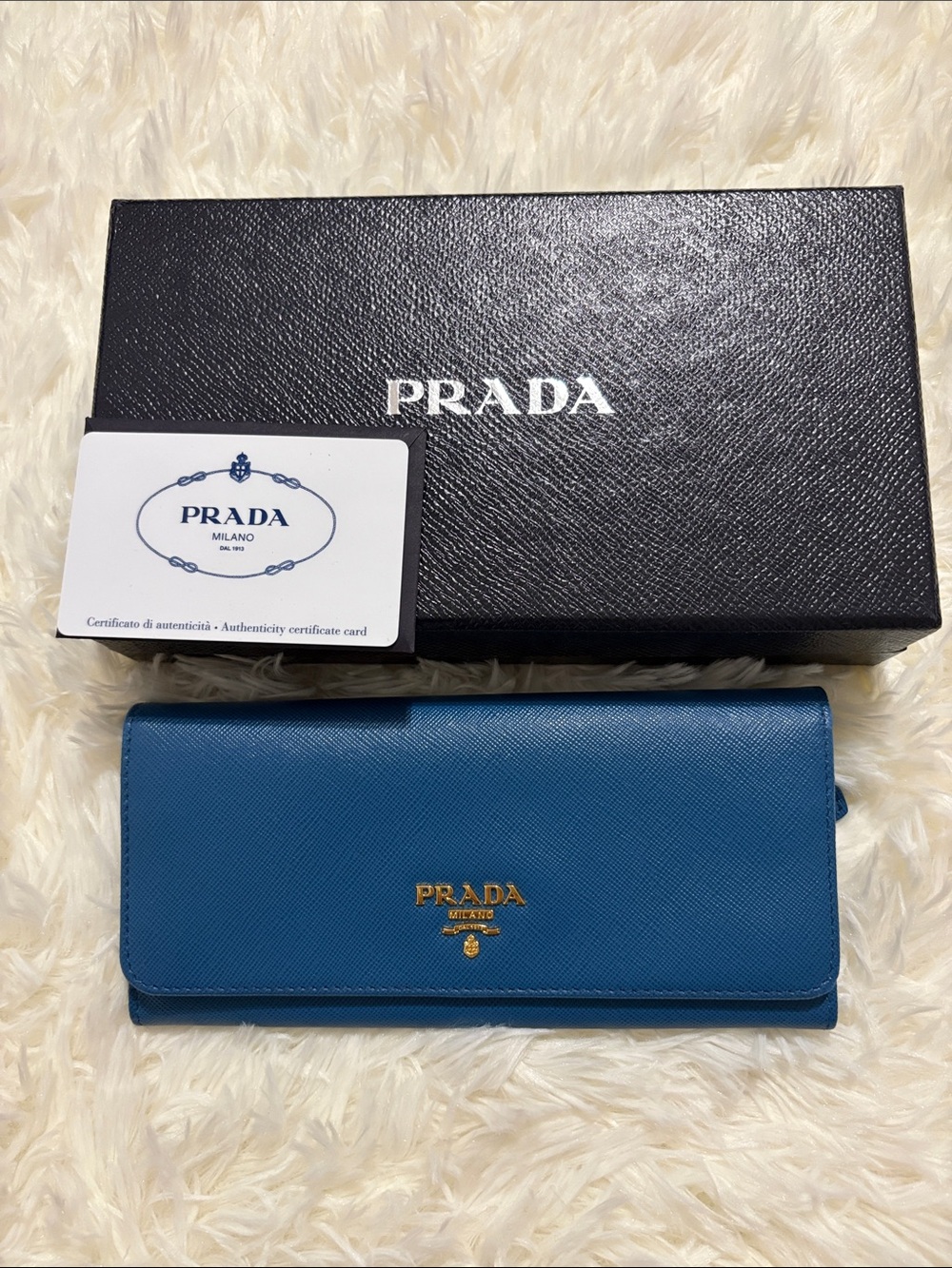 Prada Saffiano Blue full size leather wallet with authentic identification card